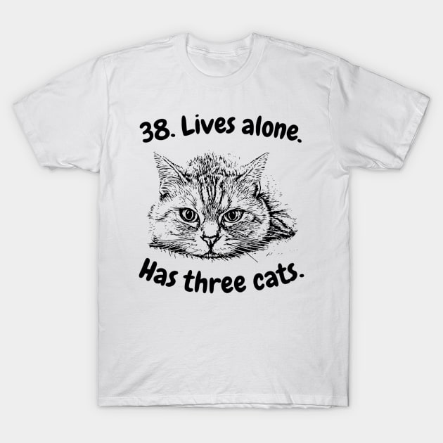 38. Lives alone. Has three cats. Funny T-Shirt by LukjanovArt